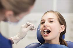 Girl getting dental sealants in Syracuse