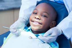 Young boy visiting for children’s dentistry in Syracuse