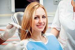 Woman smiling in dental chair