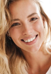 Closeup of woman with blonde hair smiling